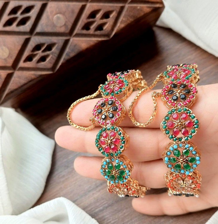 open. Able noratan bangles. Pair